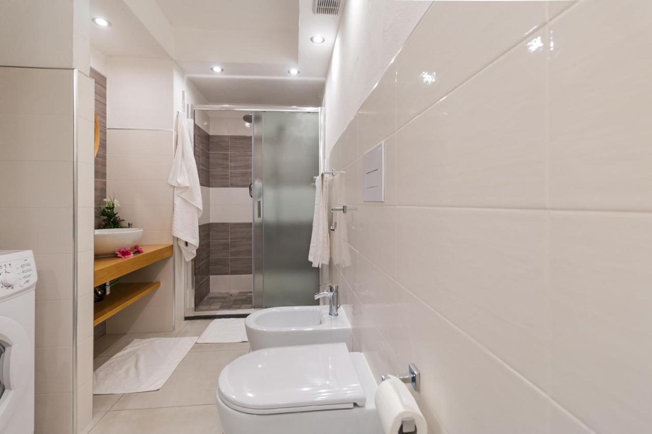 Purple Flower Suit Apartment Cala Gonone Buitenkant foto
